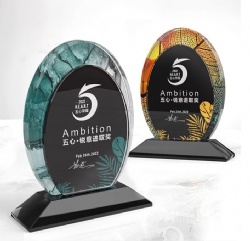 Oval Crystal with Green and Orange Accents